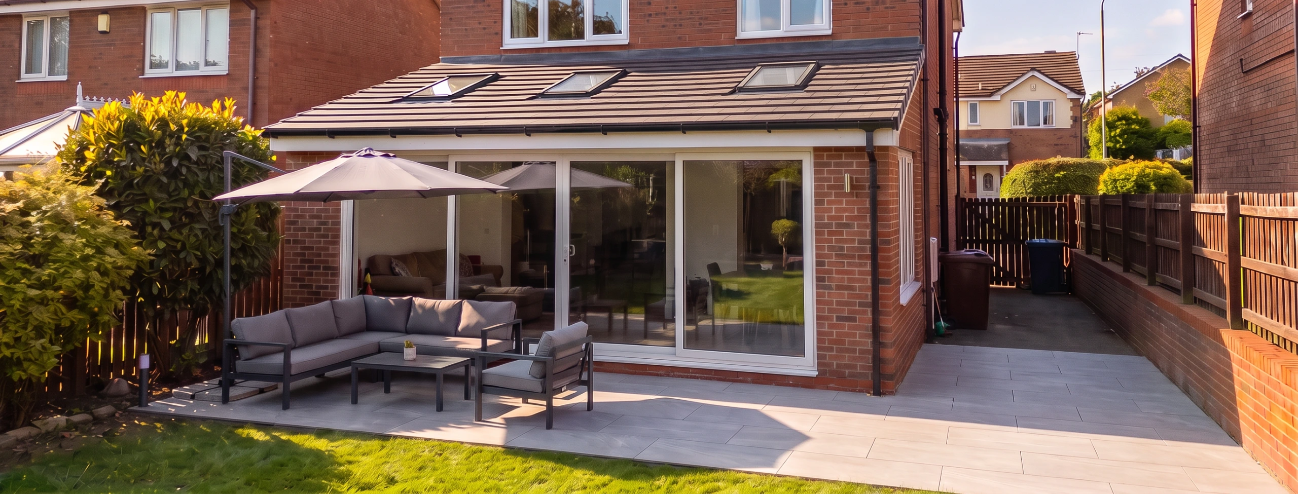 Visualisation of a single storey rear extension with roof lights and large sliding doors onto the garden at a detached house in Darton, Barnsley